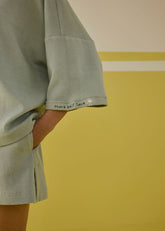 A Model Wearing Multicolor Organic Cotton More Self Love Organic Cotton T-Shirt, curated by Only Ethikal